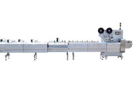 Vyrovnávač a balič cukroviniek v jednom